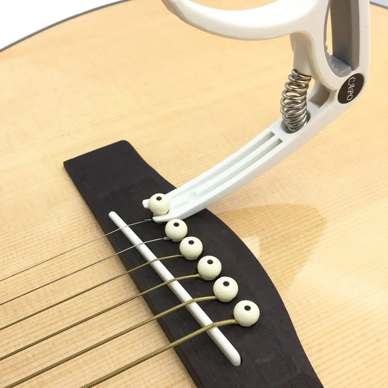 Plastic Gitaar Capo voor 6-sna - Musical Instrument Gif recensie en prijs